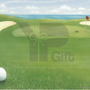 Golf ball on green by bunker, flag in distance.